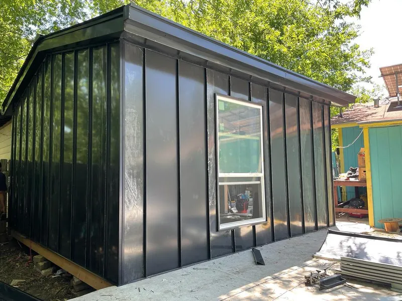 Black standing seam metal wall panels for Roof Inspection in California City